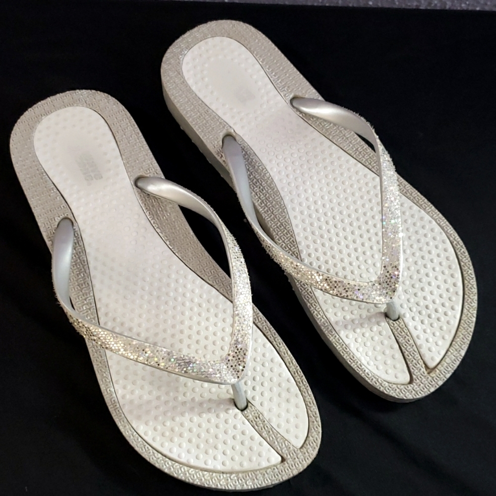 Silver/white flip flops